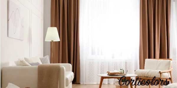 Cortinas aislantes térmicas diseñadas para proteger la vivienda del frío y del calor, mostrando un tejido grueso que ayuda a mejorar el confort y la eficiencia energética del hogar.